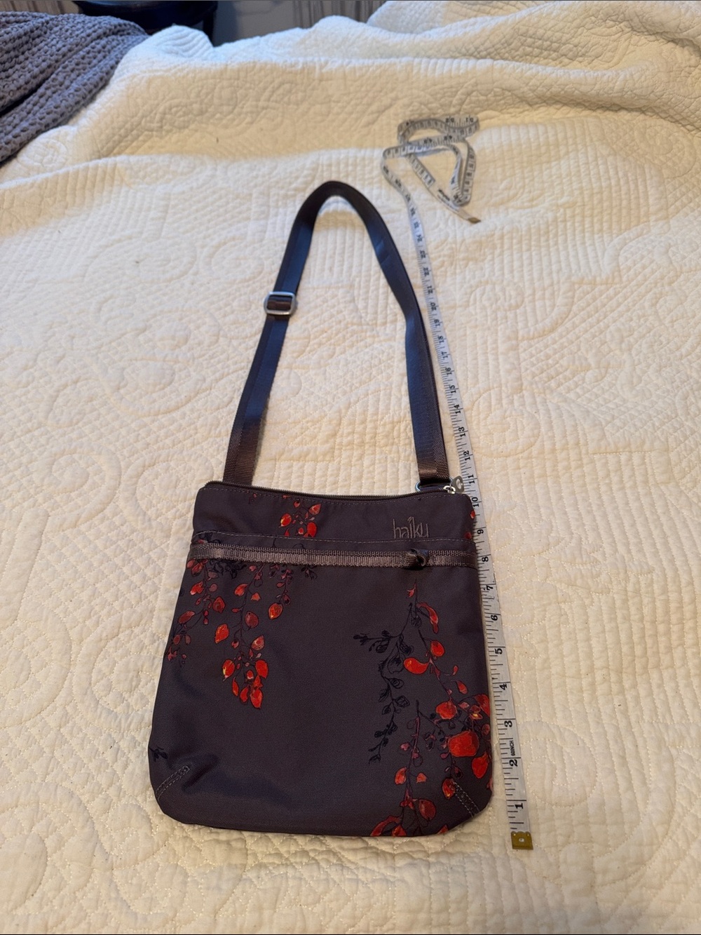 Haiku Dark Gray Crossbody Bag with Red Floral Print